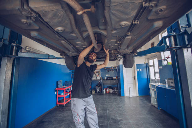 istock Man repairing a car 877920596
