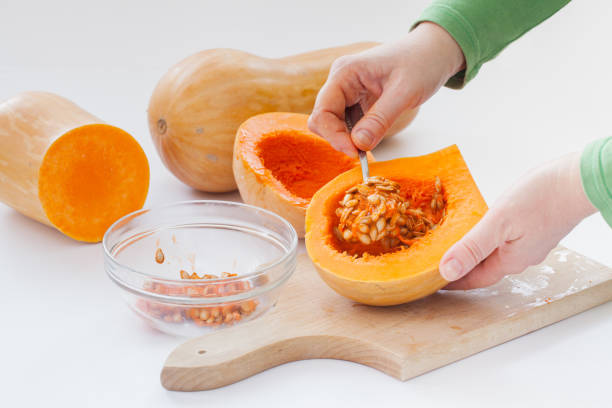 removal of healthy pumpkin seed stock photo