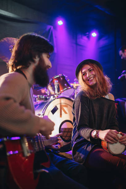 istock Hipster Couple playing music 877930150