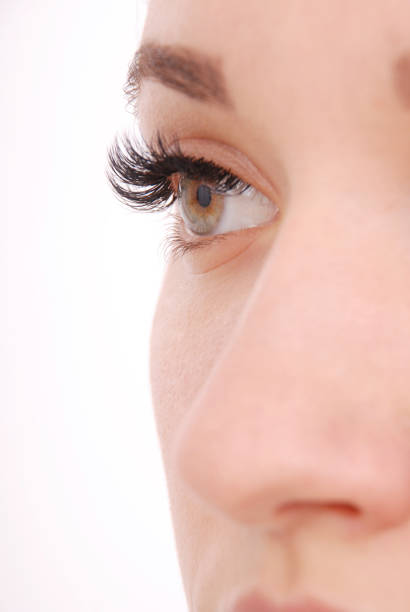 istock Beautiful woman eye with long eyelashes.  Studio shot 877930520
