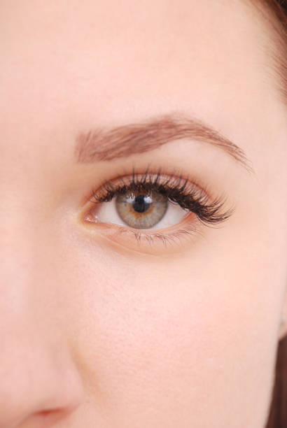 istock Beautiful woman eye with long eyelashes.  Studio shot 877930632