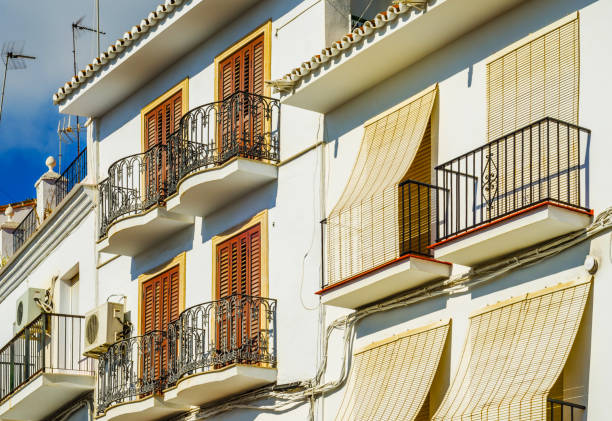 istock Stylish balcony with a metal railing, solid architectural element, a place of rest and relaxation, 877949394