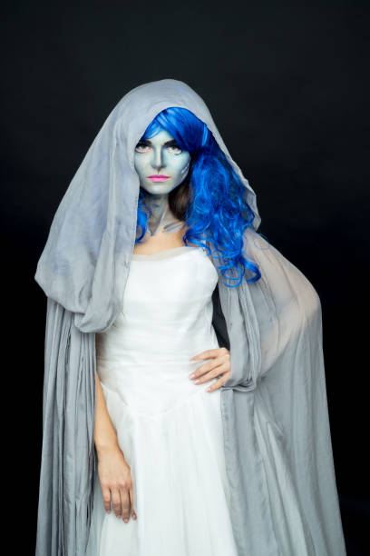 istock Makeup. Image of a witch in a bride dress 877997982