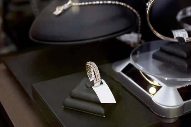 istock Diamond rings in jewelry luxury store window display 877998024
