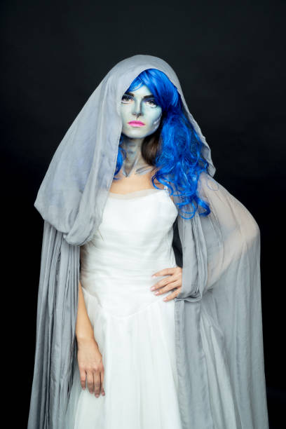 istock Makeup. Image of a witch in a bride dress 877998172