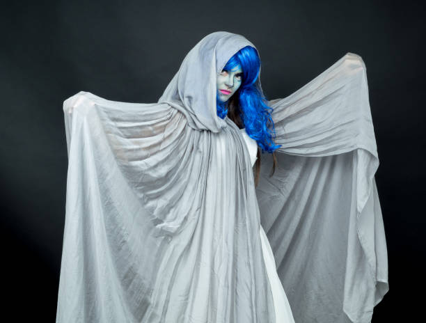 istock Makeup. Image of a witch in a bride dress 877998626