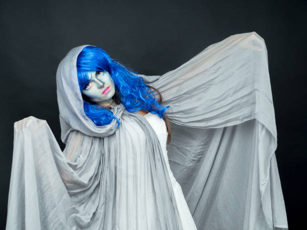 istock Makeup. Image of a witch in a bride dress 877998670
