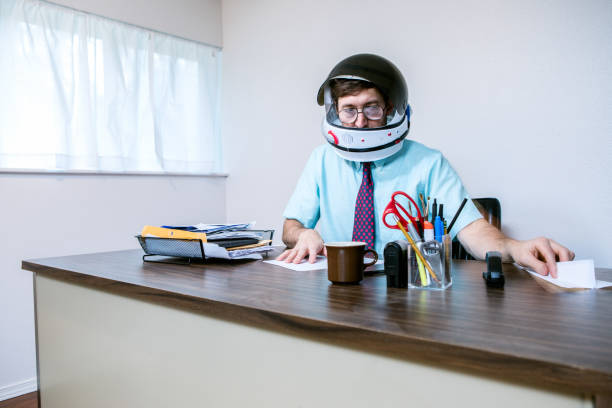 istock Office Worker Wearing Astronaut Space Helmet 878003654