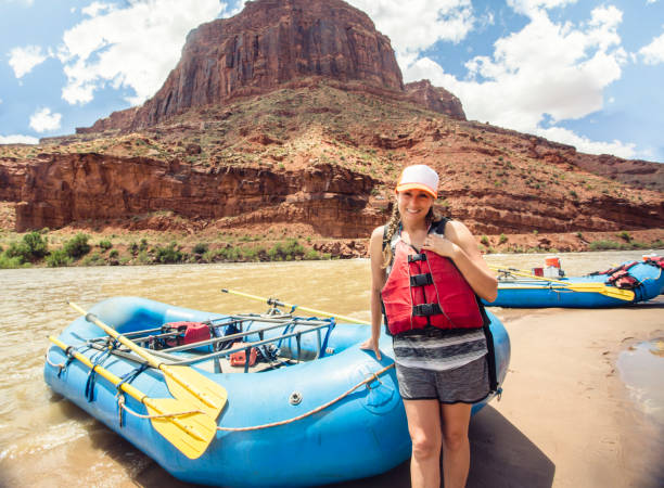 istock Woman on a rafting trip down the Colorado River 878008738