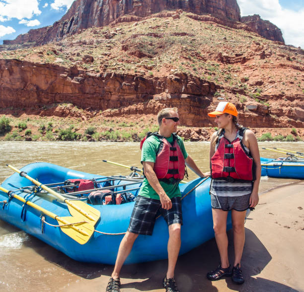 istock Couple on a rafting trip down the Colorado River 878008812