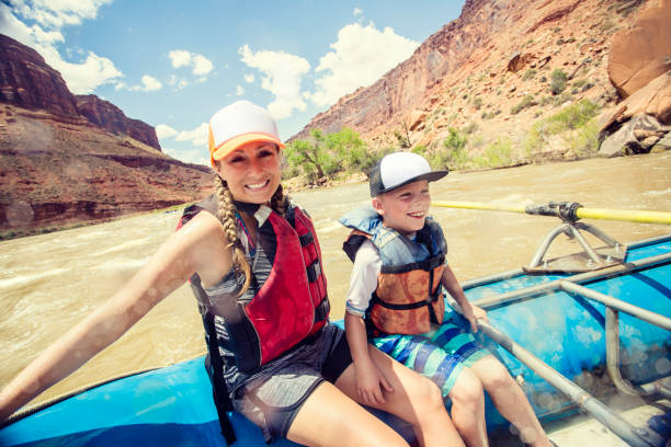 istock Family on a rafting trip down the Colorado River 878008862
