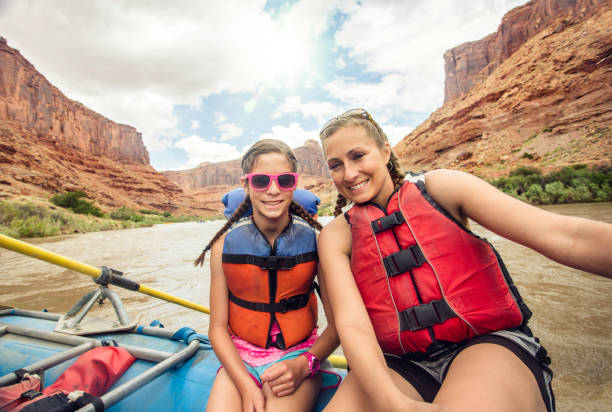 istock Active young family enjoying a fun whitewater rafting trip 878008878