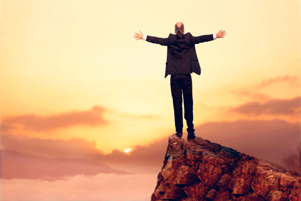 istock Businessman Success on Mountain Peak 878013066