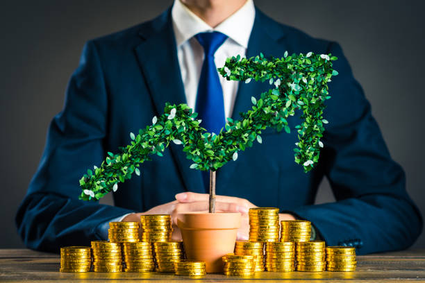 istock Businessmen with plants 878019648