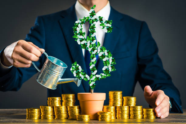 istock Businessmen with plants 878022118