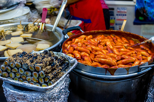 Korean street food: Tteokbokki with spicy sauce and Gimbap Kimbap