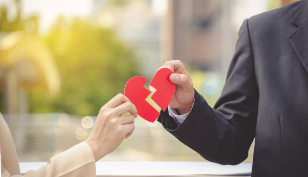 istock Close-Up Of Hand Holding Heart Shape Pieces 878037074