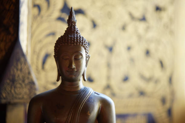 istock Golden Buddha statue in Thailand 878056008