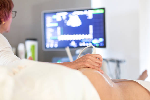 istock Doctor Examining Patient At Hospital 878056212
