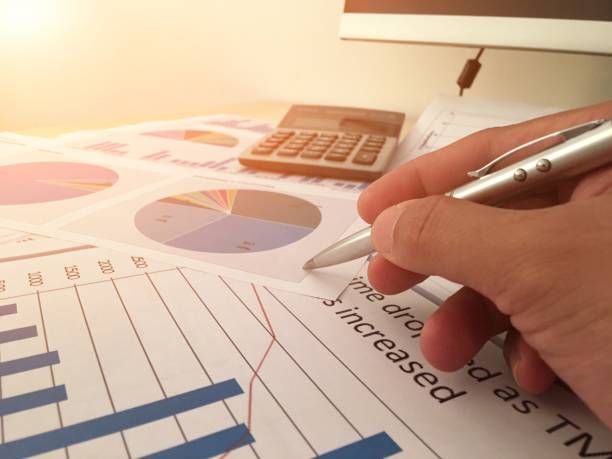 istock Close-Up Of Man Working At Table 878058470