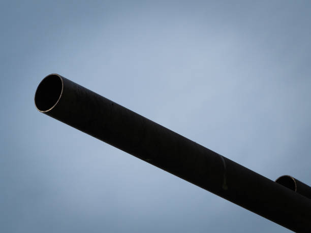 istock Beautiful silver Stack of steel pipes abstract background. 878058740
