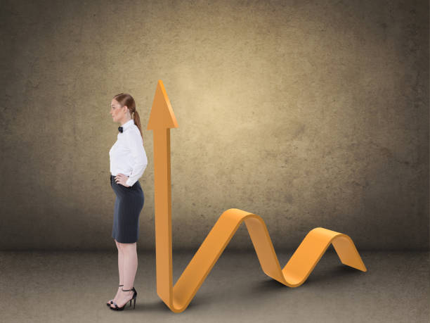 istock Businesswoman with success graph 878077716