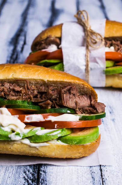 istock Sandwich with meat and vegetables 878077916