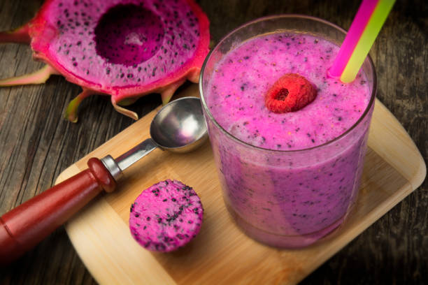 Dragonfruit Purple Smoothie Drink With Rasberry And Straws Dragonfruit Purple Smoothie Drink With Rasberry And Straws pitaya stock pictures, royalty-free photos & images