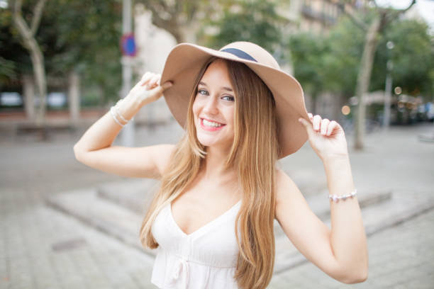 istock Positive Young Beautiful Woman Outdoors in Summer 878095996