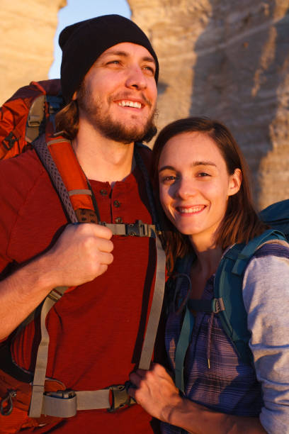 istock Couple hiking together in the wilderness 878099716