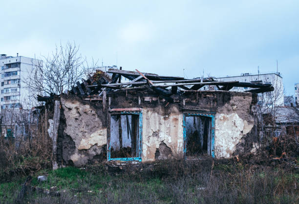 istock Poverty and unemployment. Old abandoned house 878116234