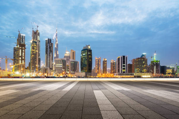 istock empty marble floor with modern buildings at twilight 878141252