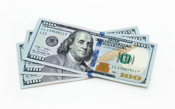 istock One hundred dollars banknotes isolated on white background 878154698