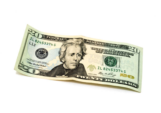 istock 20 dollars banknote isolated on white background 878154718