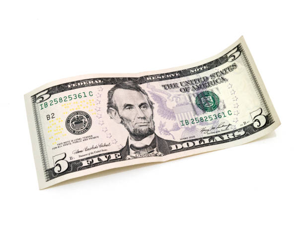 istock 5 dollars banknote isolated on white background 878154730