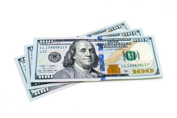 istock One hundred dollars banknotes isolated on white background 878154764