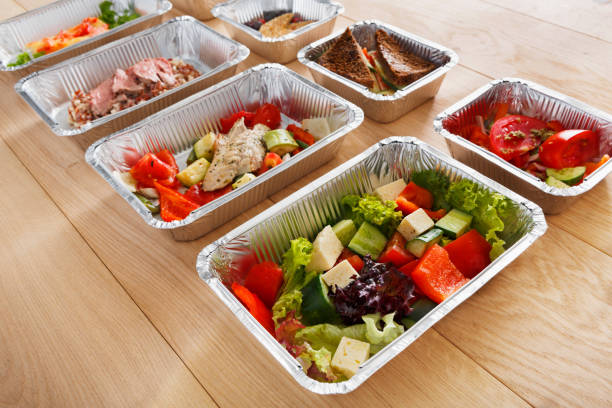 istock Healthy food in boxes, diet concept. 878156486