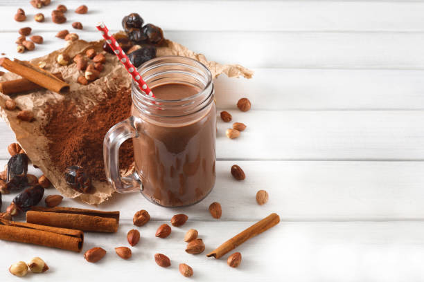 istock Natural detox chocolate smoothie ingredients on white background 878163750