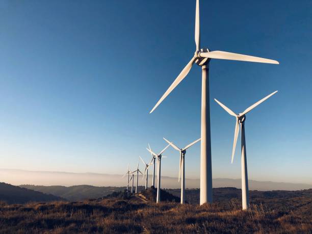 erneuerbare energieanlagen (windpark) - windenergie fotos stock-fotos und bilder