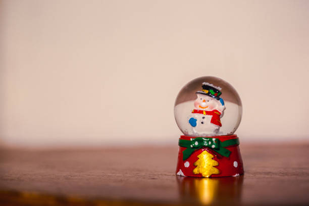 istock snowman glass ball, a gift for christmas 878172988