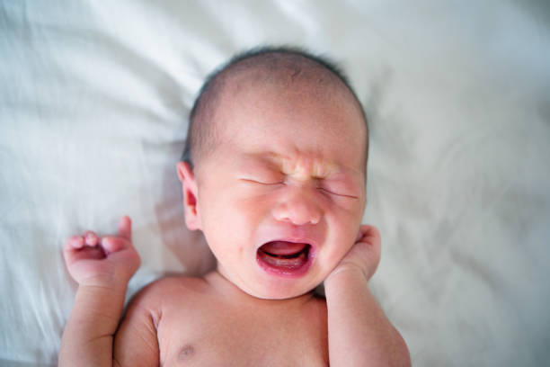 istock Asian new born baby boy crying 878173272