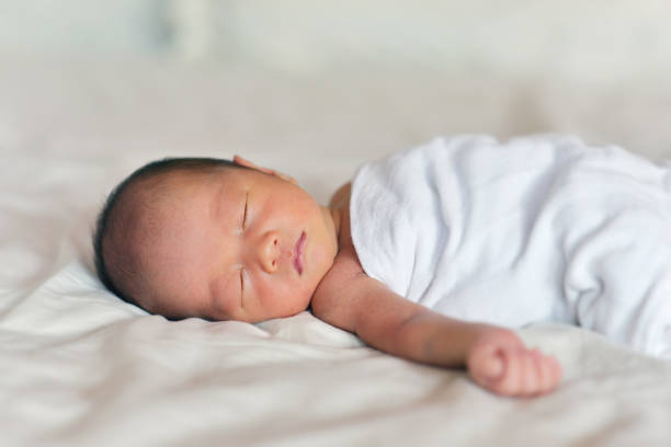 istock Newborn baby boy sleeping 878173466