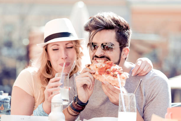 istock Young couple hugging in the city 878173960