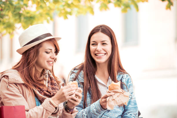 istock Friends having fun in the city 878179712