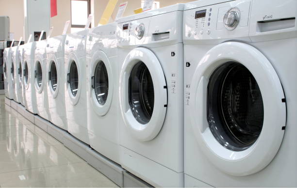 istock Rows of washing machines in a store 878189490