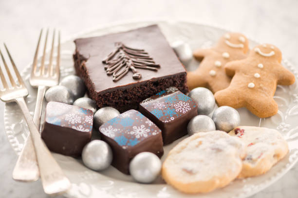 istock Elegant Winter Themed Dessert Plate, Cake, Candy, Chocolates, Cookies 878195046