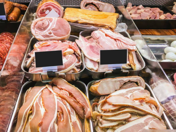 istock Variation streaky bacon in market stall 878198344