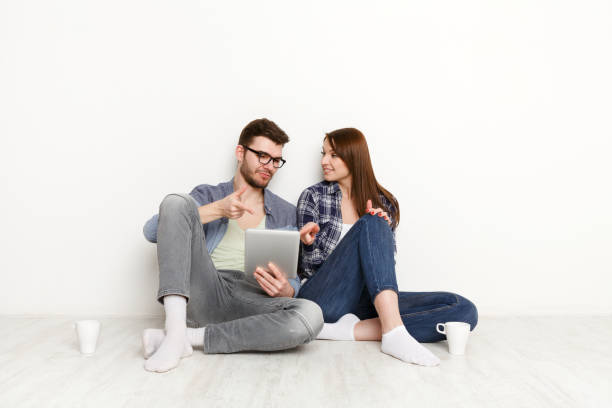 istock Couple shopping online on digital tablet 878198832