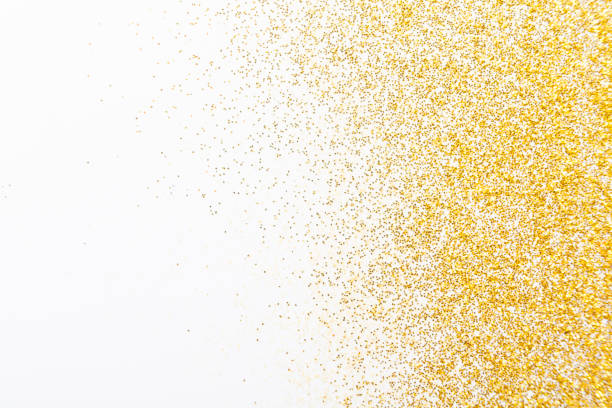 Golden glitter sand texture, abstract background.