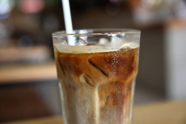 istock Iced coffee on wood background 878210740